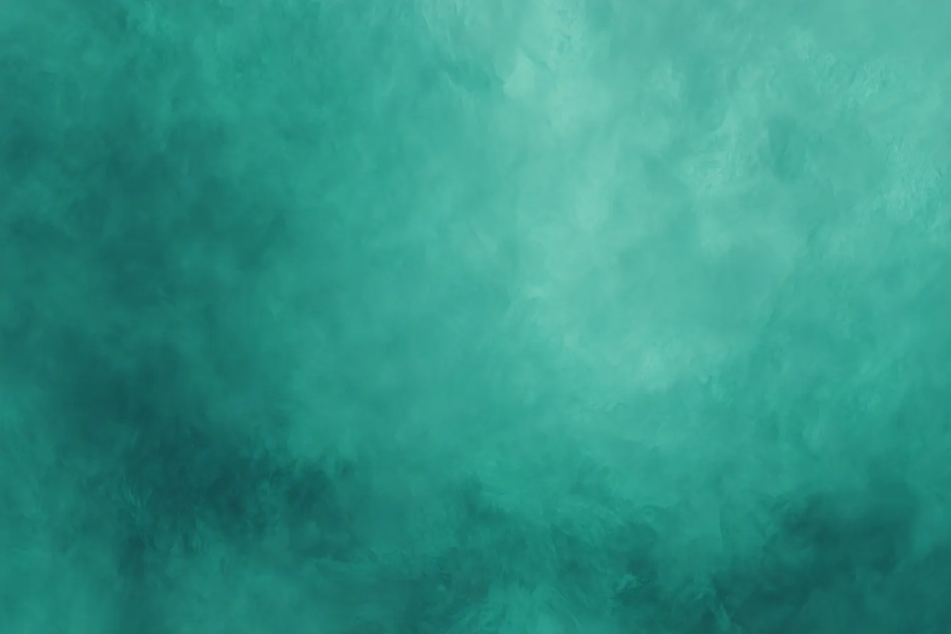 エメラルドグリーンの背景と柔らかな印象｜エメラルドグリーンが漂う背景が、やわらかく落ち着いた雰囲気を演出し、穏やかでリラックスできる空間を提供します。