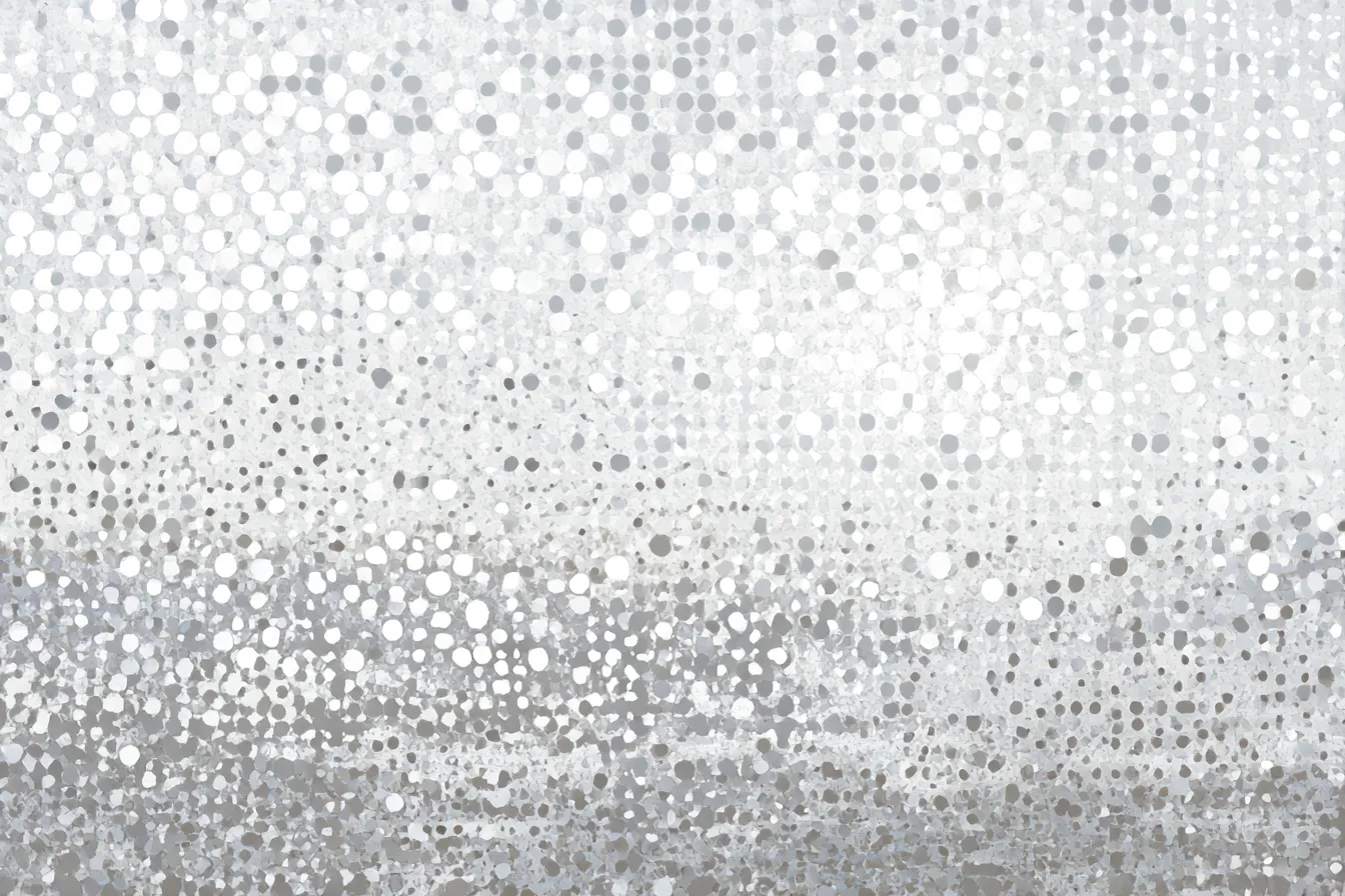 グレーのドット背景｜グレーと白の淡い色合いで構成されたドット模様。全体的にクールでモダンな印象を与え、「ドット」の配置が視覚的に統一感を持たせ、シンプルながらも洗練された雰囲気を感じさせます。