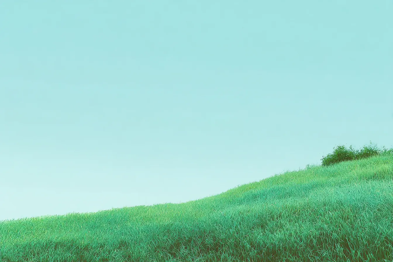 ミントグリーンの草原背景の風景｜自然の穏やかさを感じさせる「ミントグリーン」の背景が広がる草原。さわやかな色合いと柔らかい風合いが、リラックスした雰囲気を醸し出し、広がる景色が心地よい開放感を与えます。