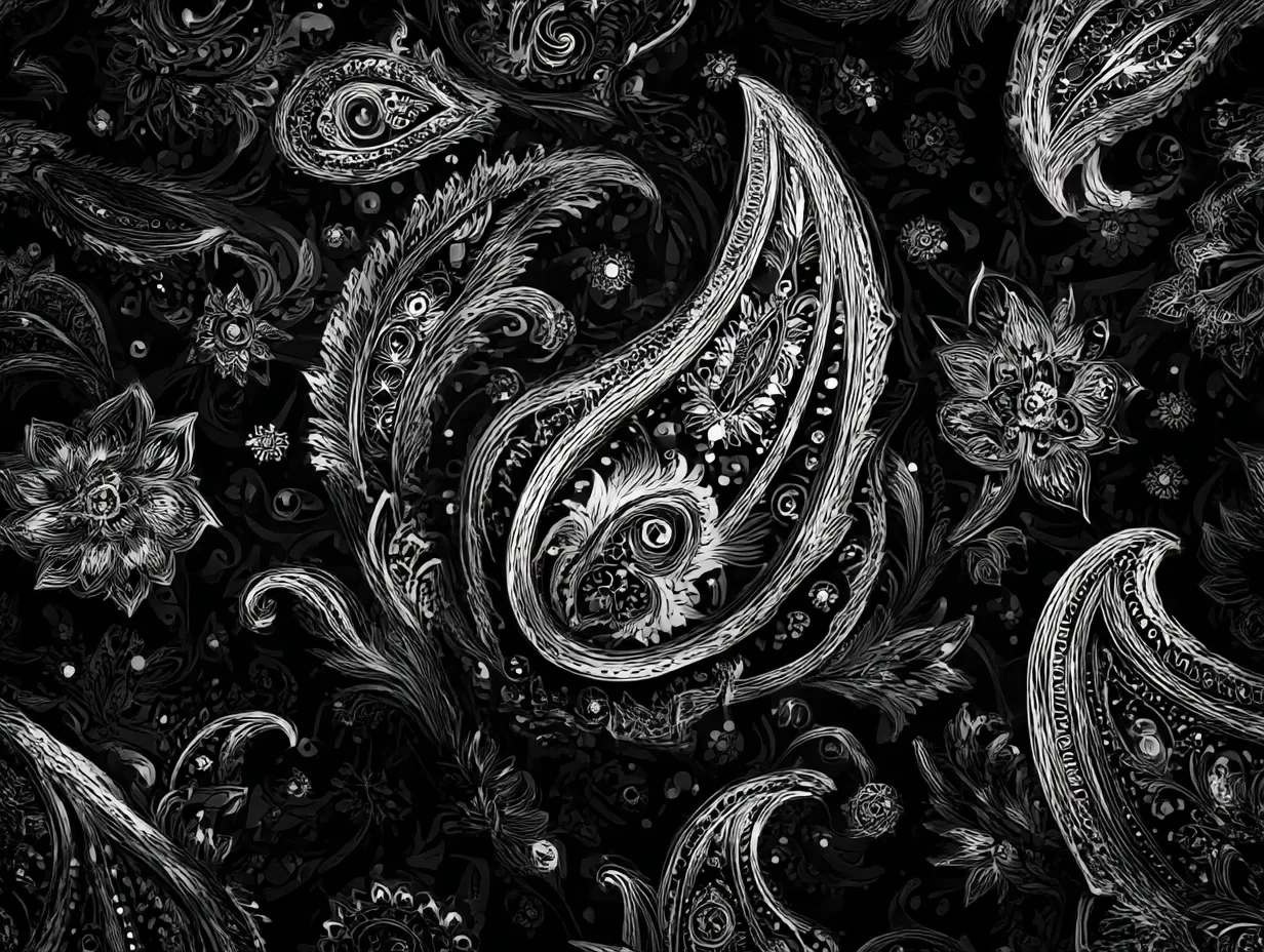 ペイズリー柄の黒白アート模様｜モノクロの世界に緻密な線が浮かび上がる、どこか幻想的で神秘的なペイズリー柄。作者が亡き妹のために描き続けたとされる図案には、光と闇が共存するような寂しさと力強さが宿っています。