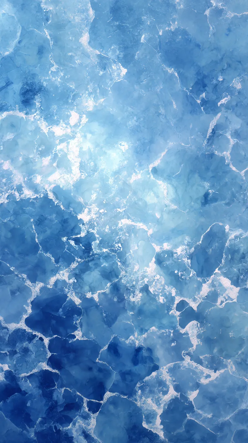 おしゃれかっこいい青壁紙 氷結の輝き｜氷の結晶が砕け散ったかのような繊細な模様が広がり、冷ややかな光を反射する。透明感ある青の階調が氷原を思わせる造形となり、おしゃれかっこいい青壁紙として静謐な雰囲気を纏う。